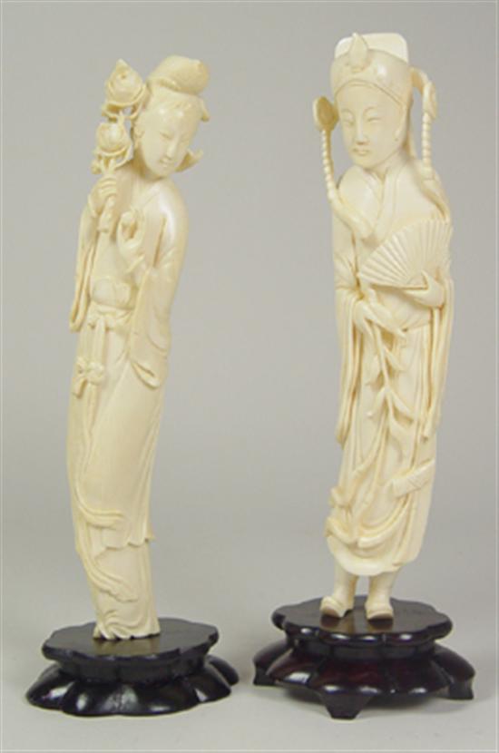 Appraisal: Pair of Carved Ivory Figurines Mounted on wooden bases Beautifully