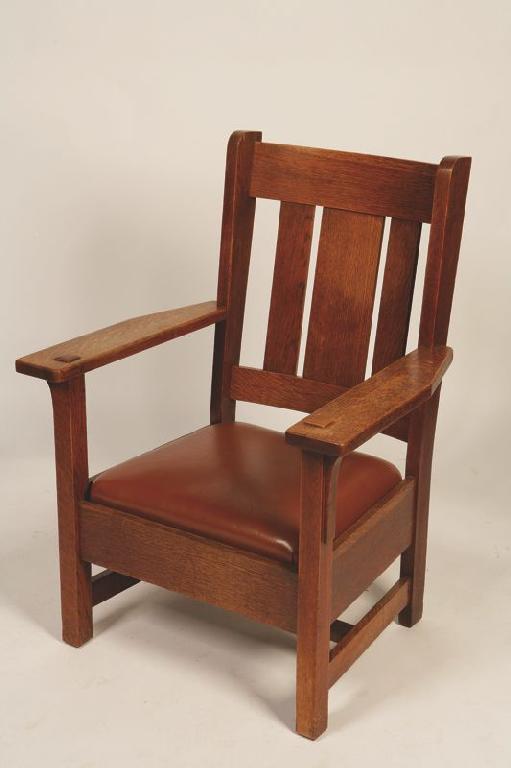 Appraisal: ATTRIBUTED TO GUSTAV STICKLEY AN OAK ARTS AND CRAFTS ARMCHAIR