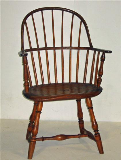 Appraisal: Sack back Windsor armchair branded W Cox Flat shaped handholds