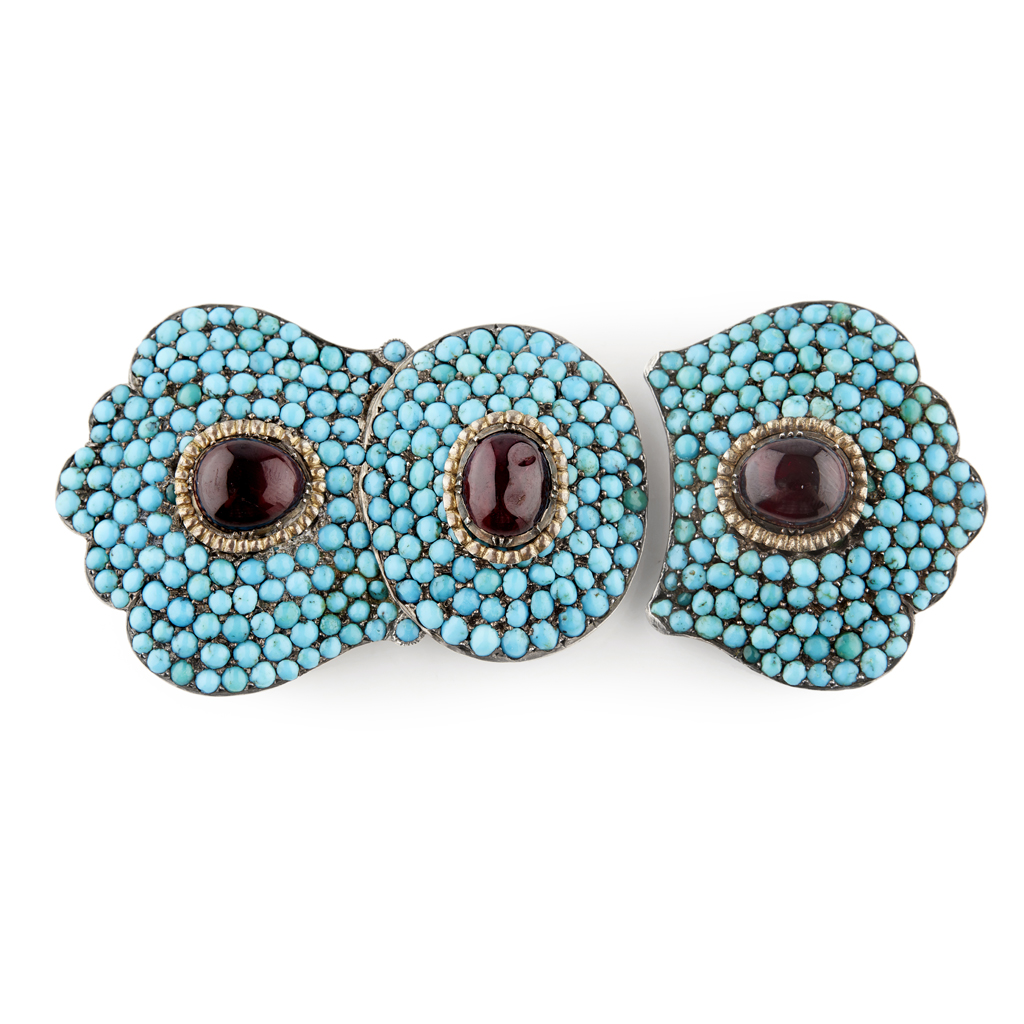 Appraisal: An early th century turquoise and garnet set double brooch