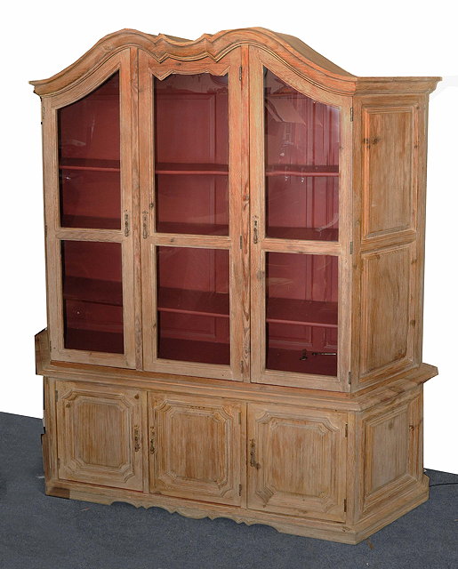 Appraisal: A CONTINENTAL LIMED PINE DISPLAY CABINET the upper section with