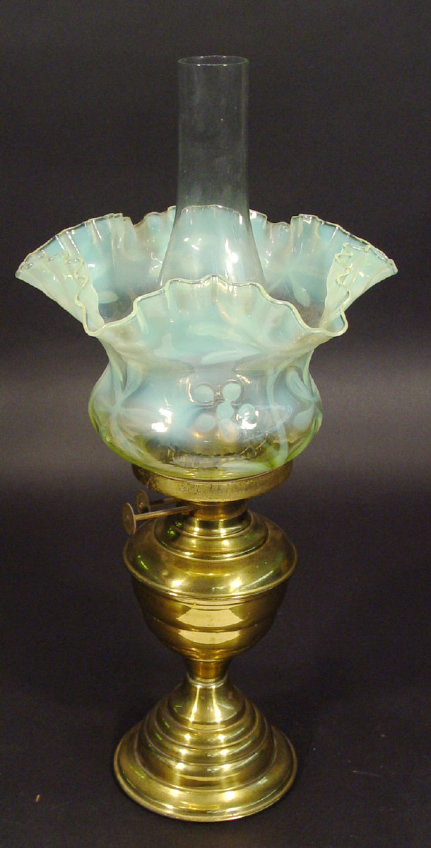 Appraisal: Brass oil lamp with glass chimney and fluted green vaseline