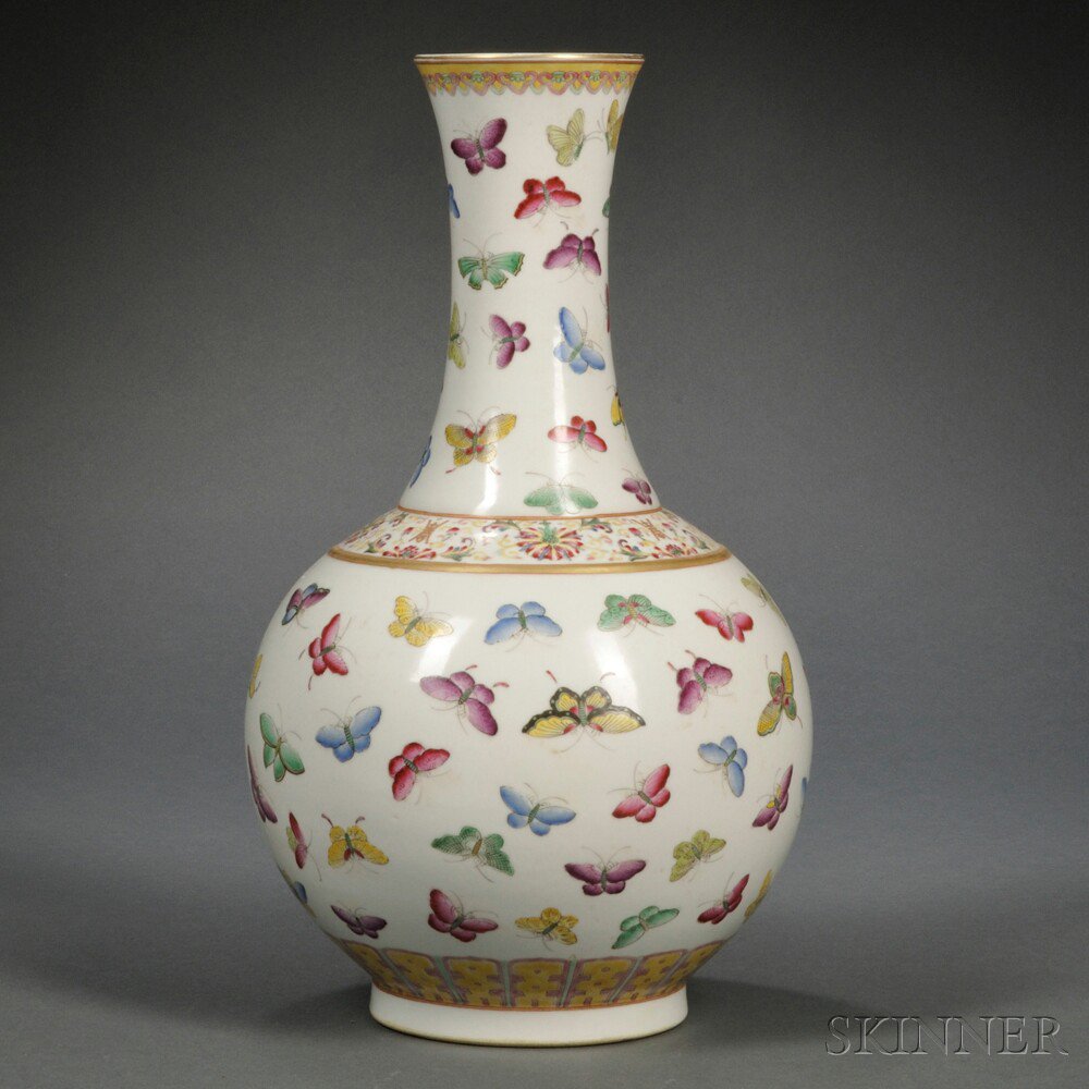 Appraisal: Famille Rose Vase China bottle shape decorated with scattered butterflies