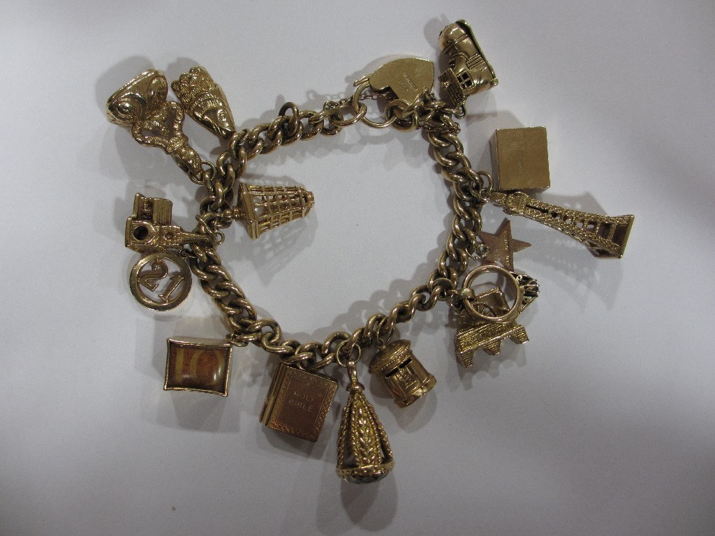 Appraisal: Nine carat gold charm bracelet with various mid to large