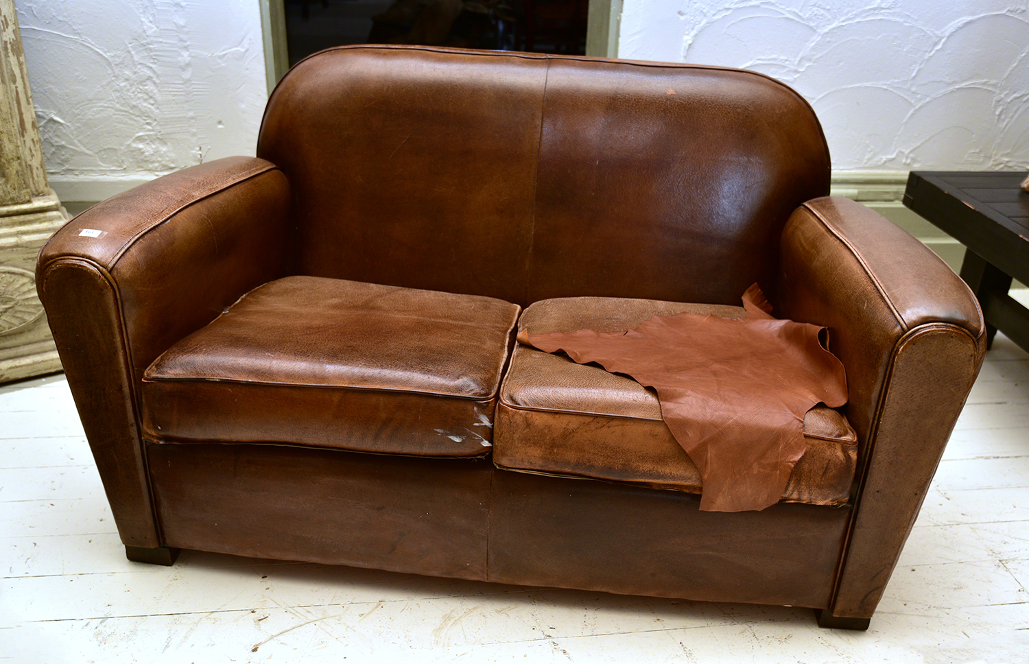 Appraisal: AN ART DECO TWO-SEATER BROWN LEATHER SOFA h x w