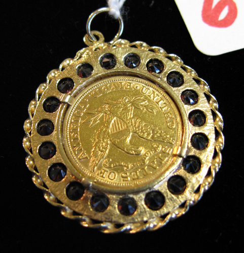 Appraisal: U S GOLD COIN GARNET AND FOURTEEN KARAT GOLD PENDANT