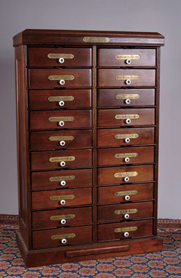 Appraisal: BROWER BROTHERS LETTER FILE CABINET Walnut twenty-drawer file cabinet with