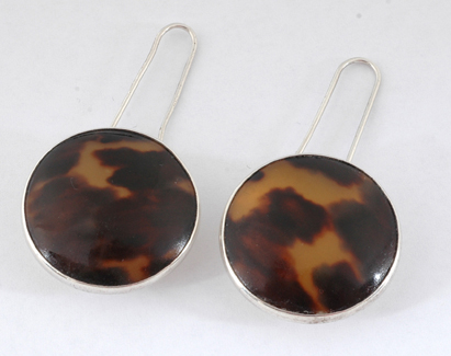 Appraisal: A pair of handcrafted silver and tortoiseshell earrings by Tracey