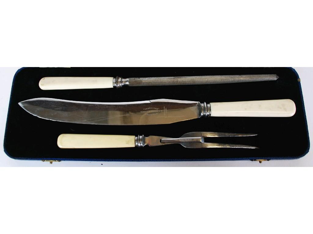 Appraisal: CASED THREE PIECE MEAT CARVING SET with ivorine handles AND