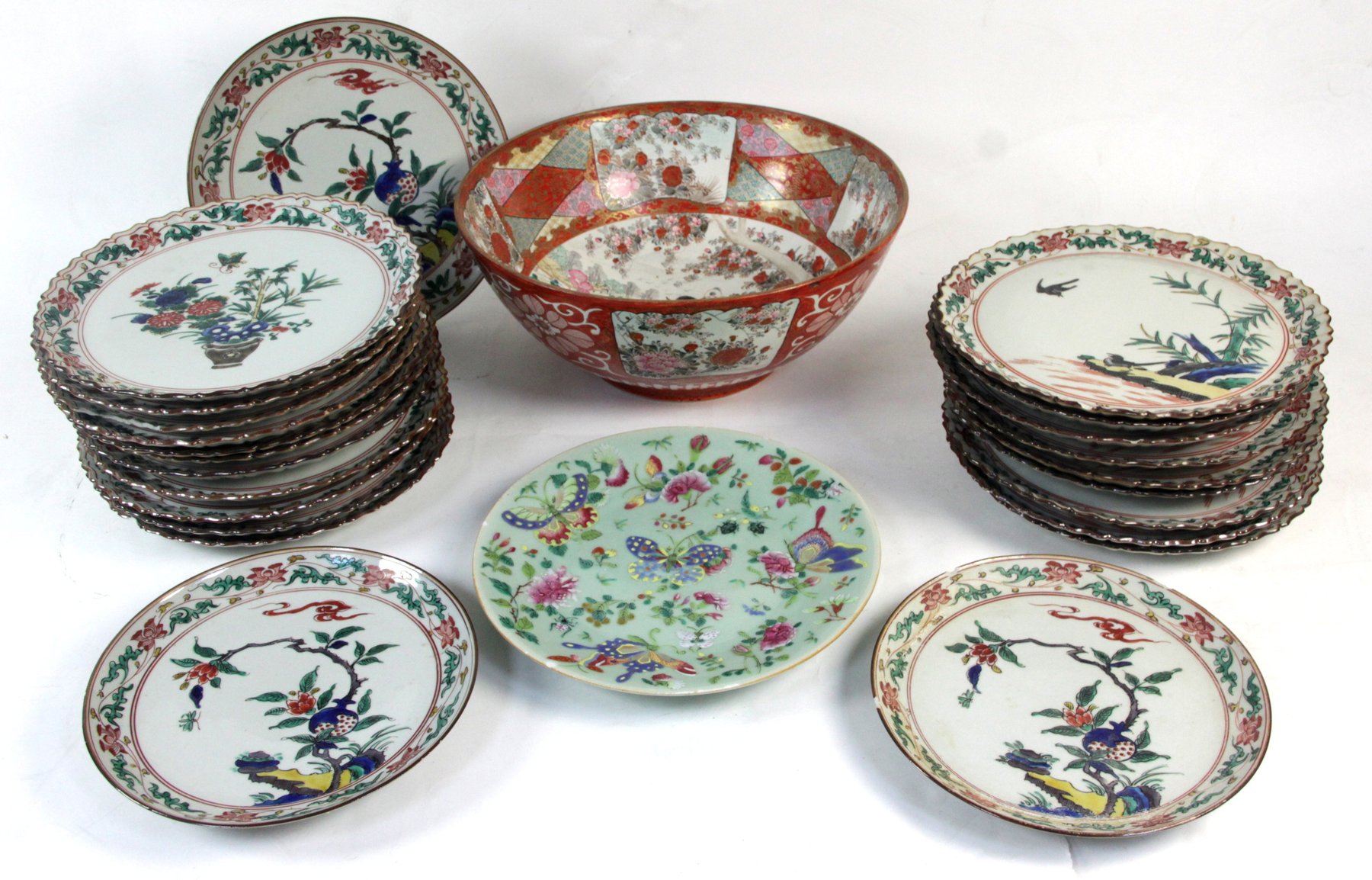 Appraisal: A Japanese Imari part dinner service painted with urns of