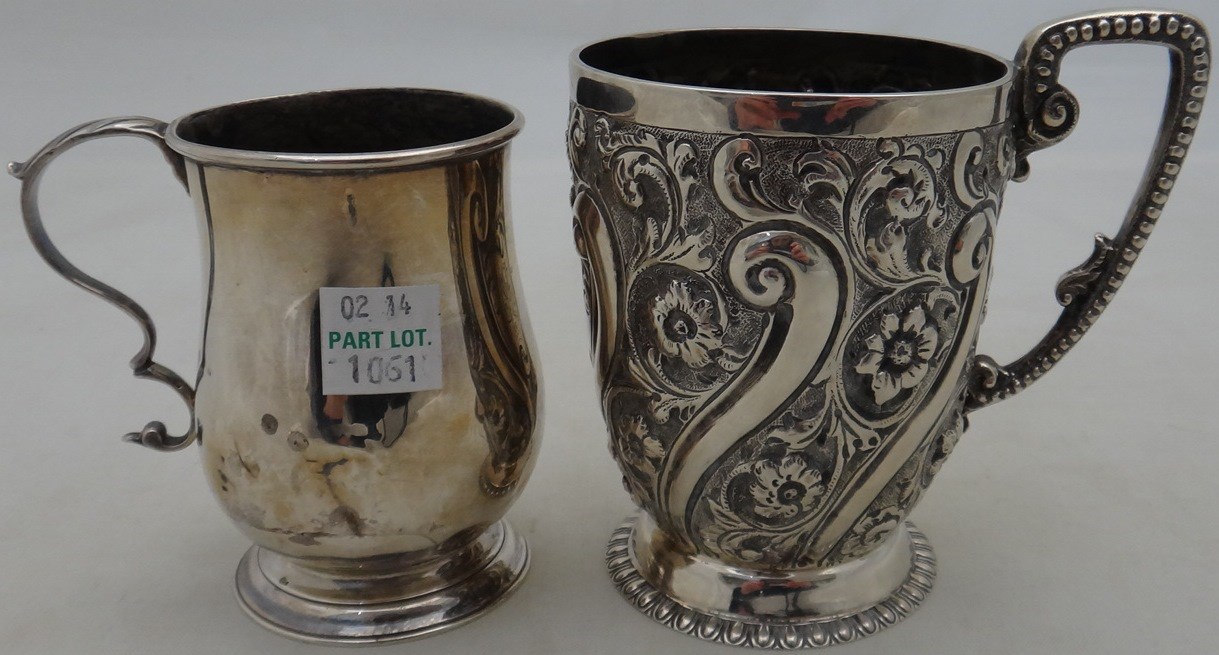 Appraisal: A Victorian silver christening mug with spiral fluted floral and