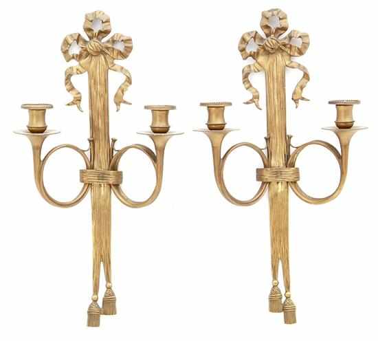 Appraisal: Pair French gilt-metal two-light wall appliques ribbon and tassel backplate