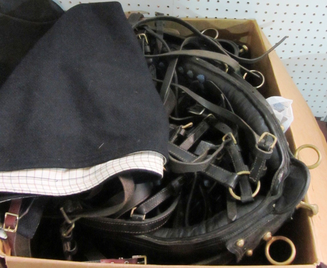 Appraisal: Equestrian interest two leather driving harnesses