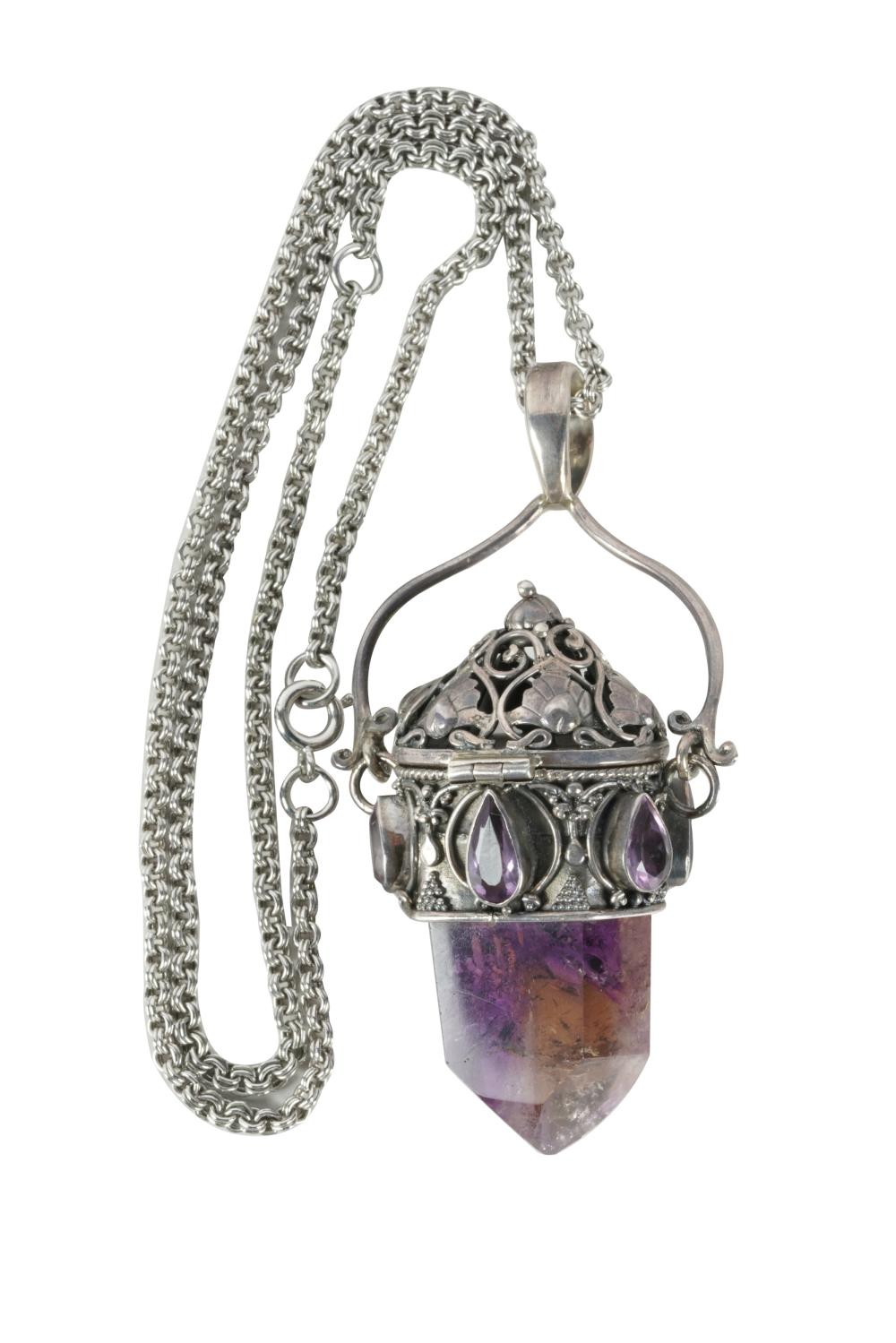 Appraisal: STERLING SILVER AMETRINE AMETHYST PENDANTcentering one ametrine crystal the sterling