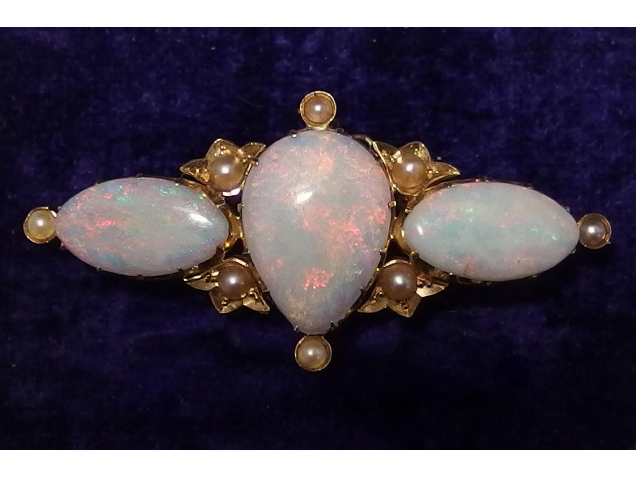 Appraisal: An Edwardian ct opal and pearl broochthe central teardrop shape