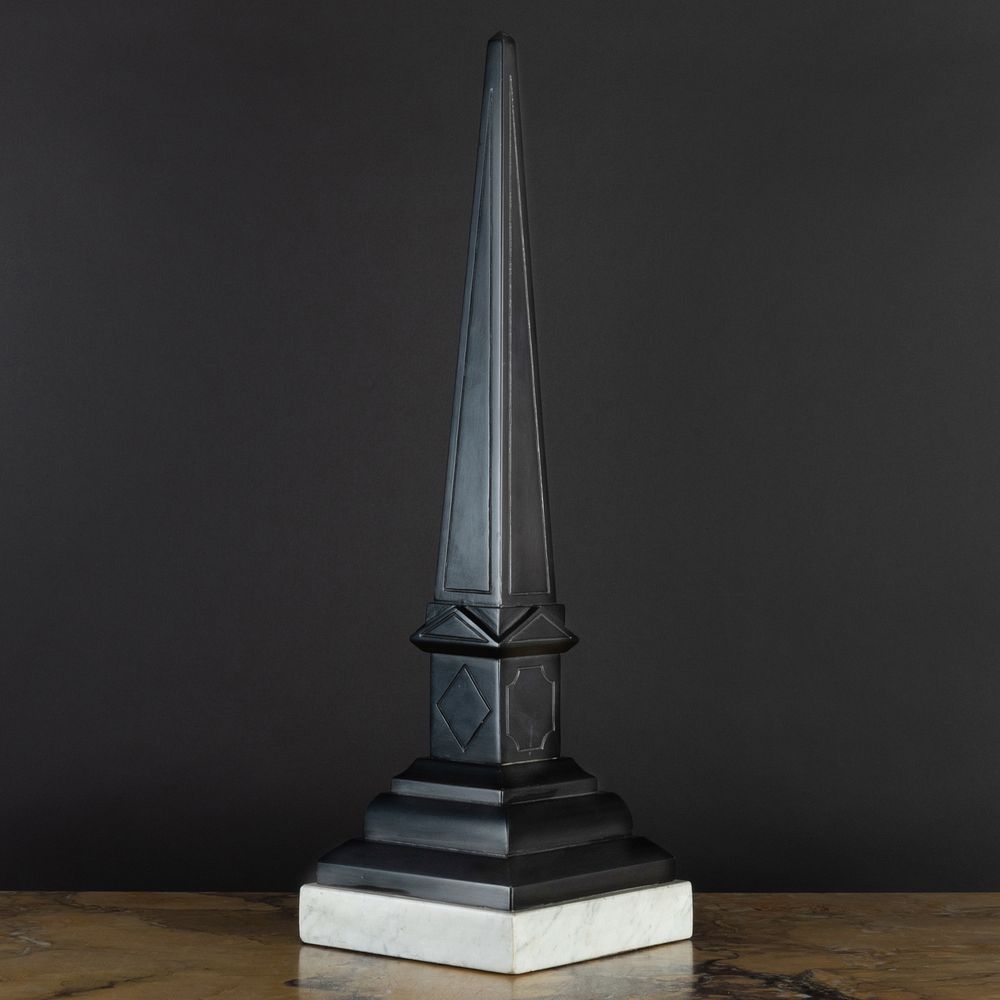 Appraisal: Belgian Black Marble Obelisk Raised on a grey marble base