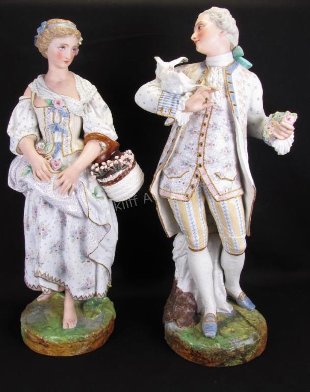 Appraisal: A pair of French bisque porcelain standing figures depicting man