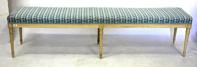 Appraisal: AN ANTIQUE CREAM PAINTED LONG LOW OVERSTUFFED UPHOLSTERED STOOL with