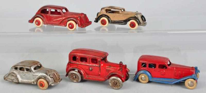 Appraisal: Lot of Cast Iron Automobile Toys American Includes one Airflow