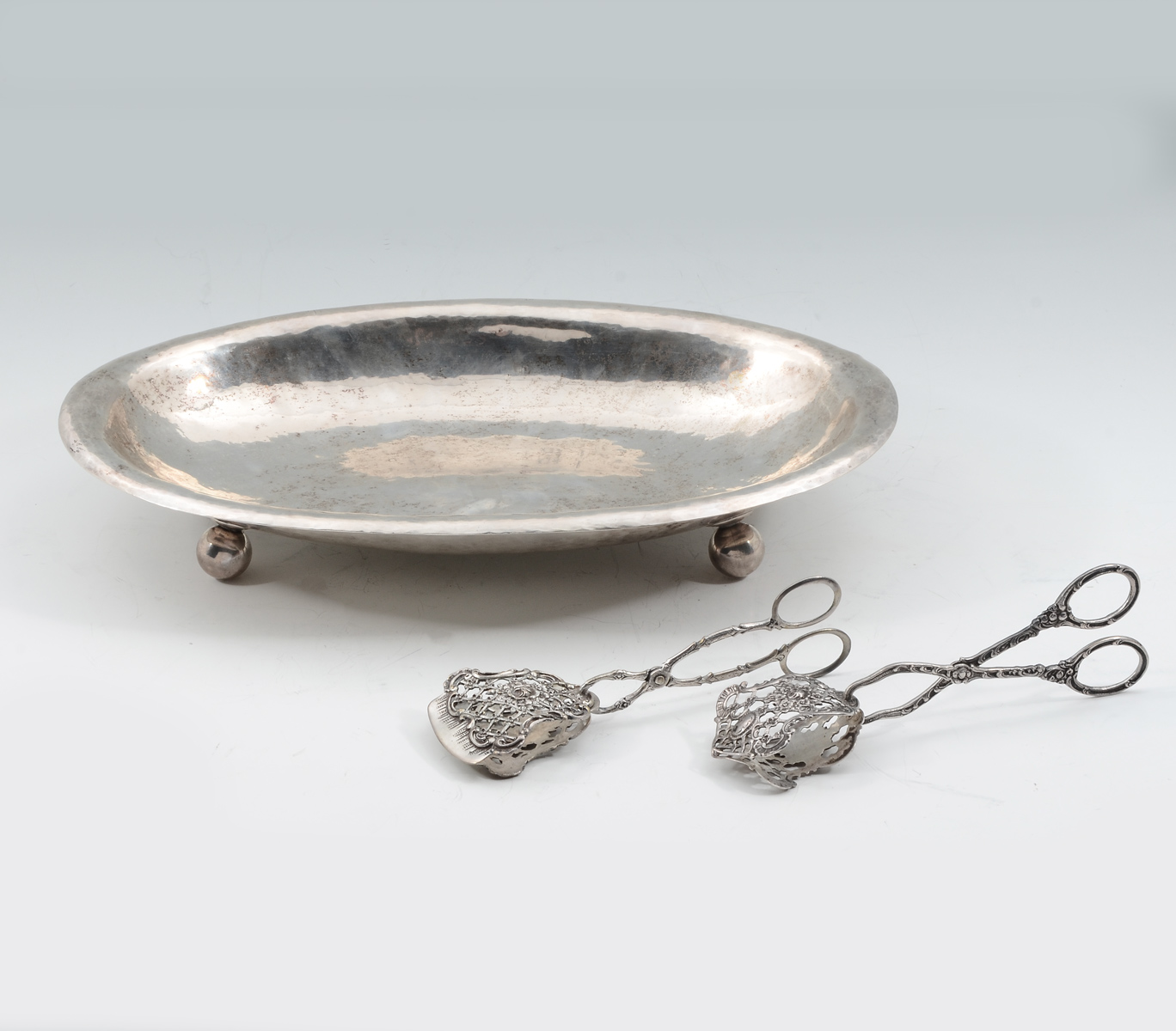 Appraisal: PC SILVER SERVING SET Comprising - hand-hammered Silver long serving