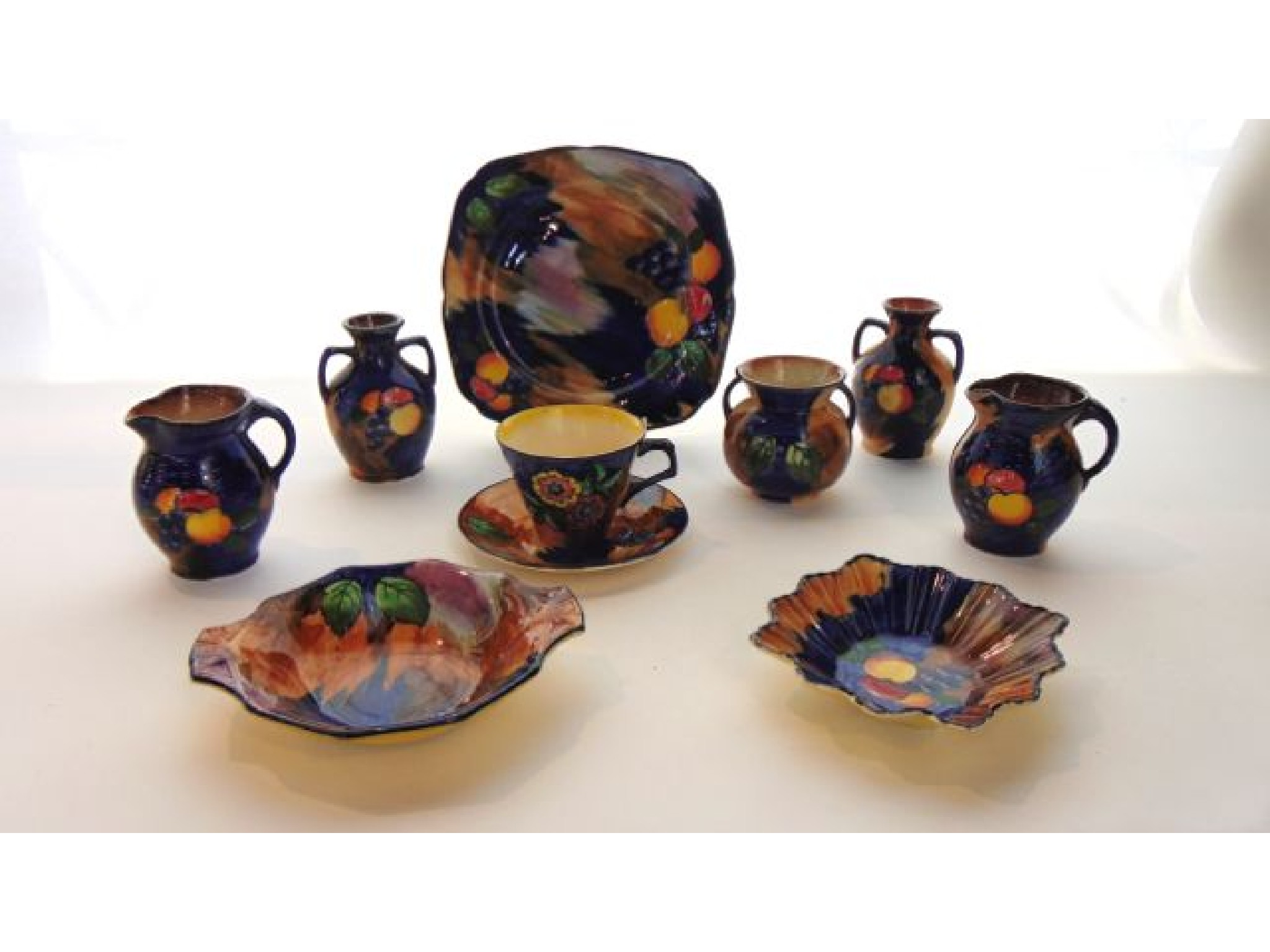 Appraisal: A collection of H K Tunstall Autumn pattern wares comprising