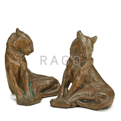 Appraisal: CLEWELL Two copper-clad cougar bookends Canton OH Both stamped x