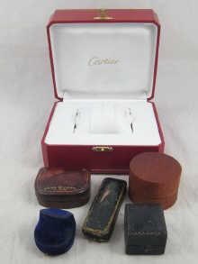 Appraisal: A modern Cartier watch box together with five earlier ring