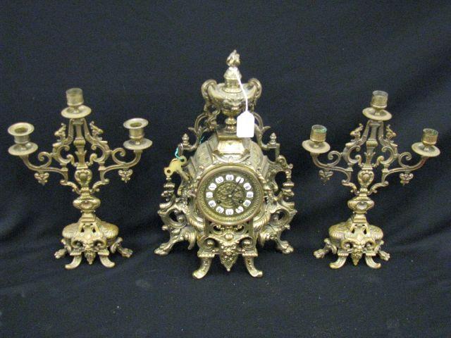 Appraisal: French Victorian Mantle Clock Candelabra ornate brass rococo design with