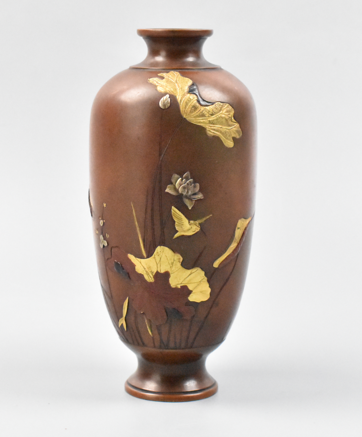 Appraisal: A Japanese mixed metal bronze vase with bird scene Meiji