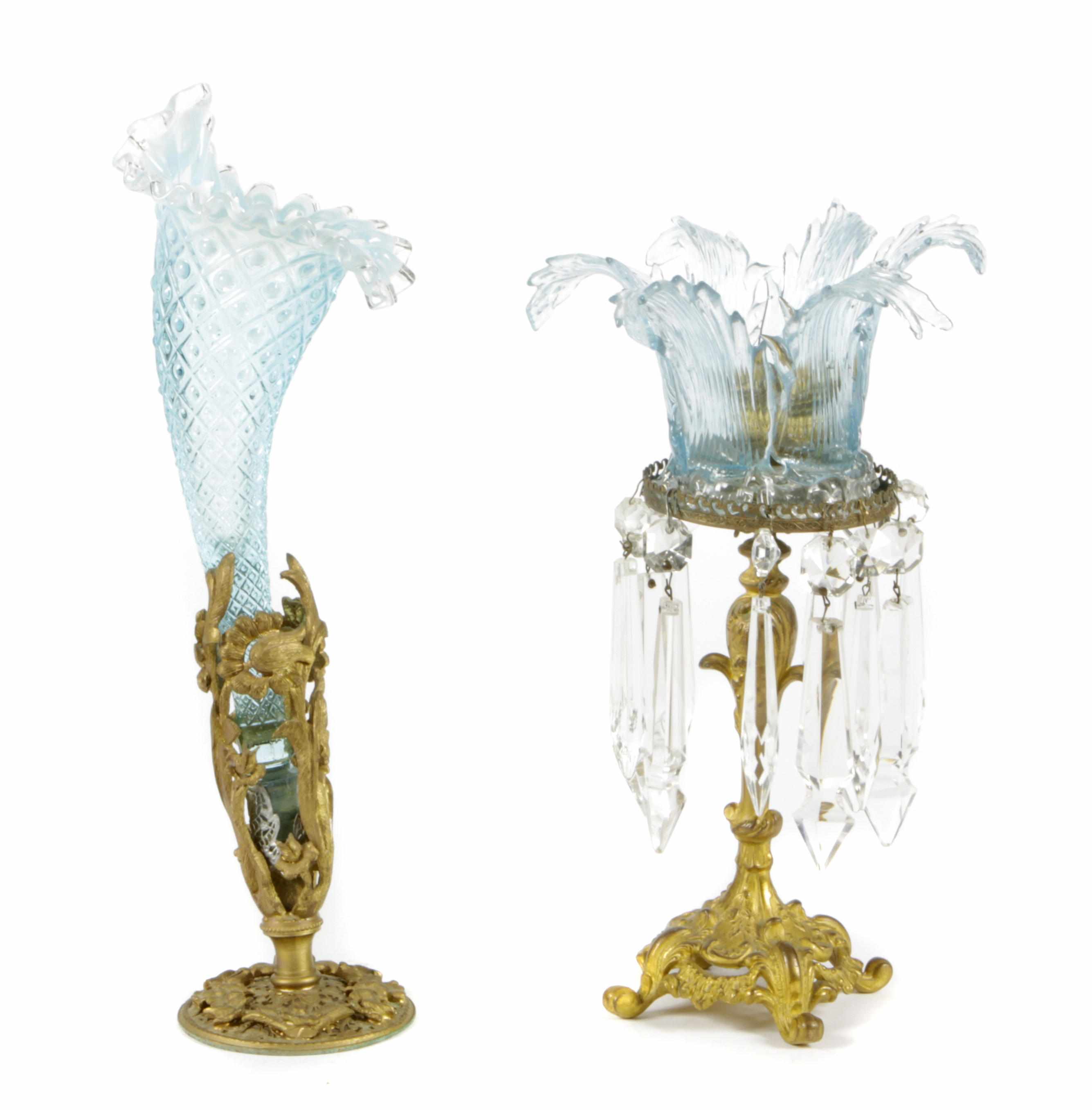 Appraisal: A gilt metal candlestick hung with facet cut prisms and