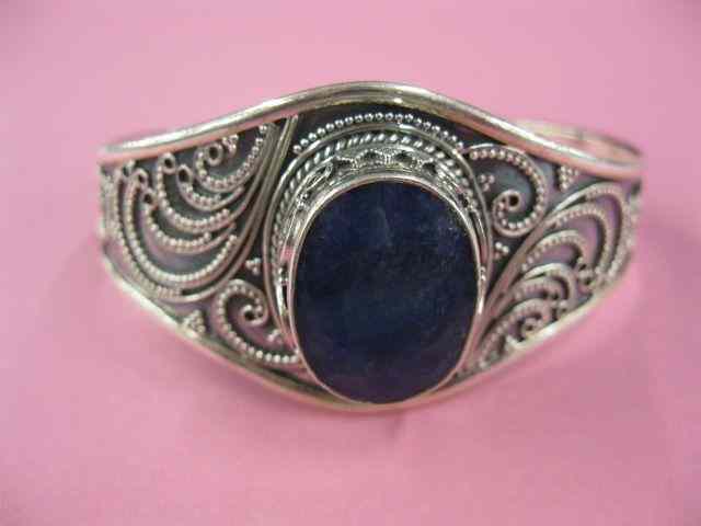 Appraisal: Sapphire Cuff Bracelet ornate design on sterling African deep blue