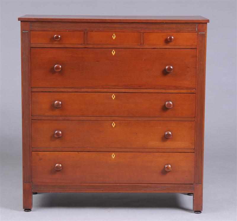 Appraisal: LATE FEDERAL CHERRY TALL CHEST OF DRAWERS Containing three frieze