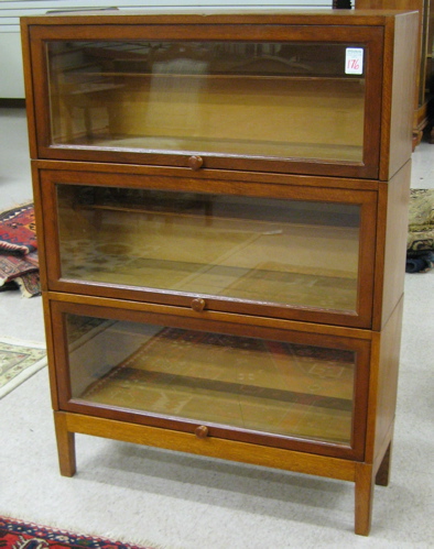 Appraisal: A STACKING OAK BOOKCASE American early th century having three