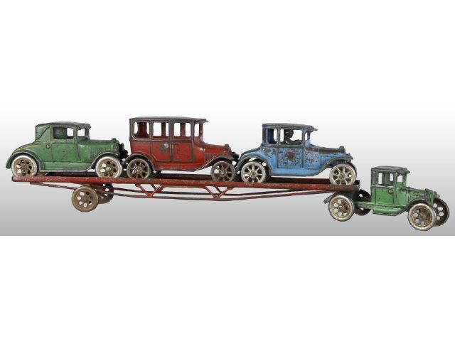 Appraisal: Arcade Car Carrier with Load of Three Cars Toy Description