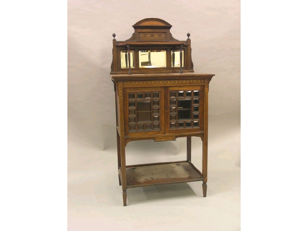 Appraisal: An Edwardian inlaid rosewood chiffonier architectural raised back with overshelf