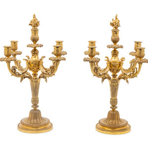 Appraisal: A Pair of Empire Style Gilt Bronze Six-Light Candelabra Late