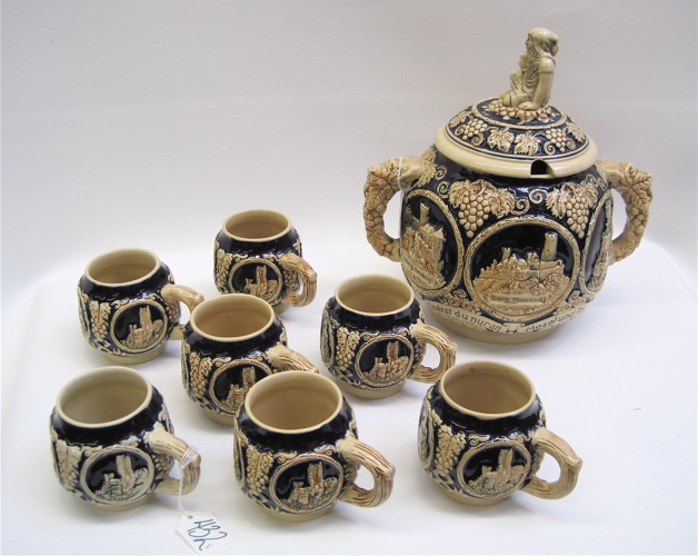 Appraisal: GERMAN POTTERY MULLED WINE CIDER SET with double handled covered