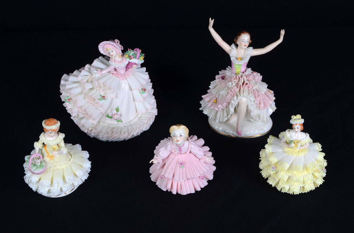 Appraisal: DRESDEN PORCELAIN LACY FIGURINES An assembled collection of tallest ''