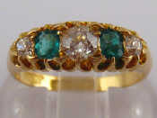 Appraisal: An carat gold emerald and diamond ring the principal diamond