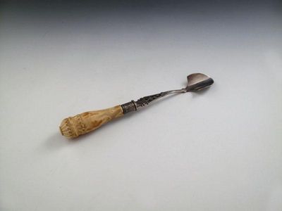 Appraisal: A Victorian silver stilton scoop by E Hutton London with