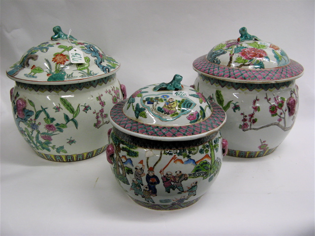 Appraisal: THREE CHINESE GLAZED POTTERY COVERED BOWLS having similar complementary decorations