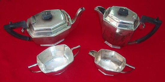 Appraisal: A three piece tea set comprising tea pot jug and