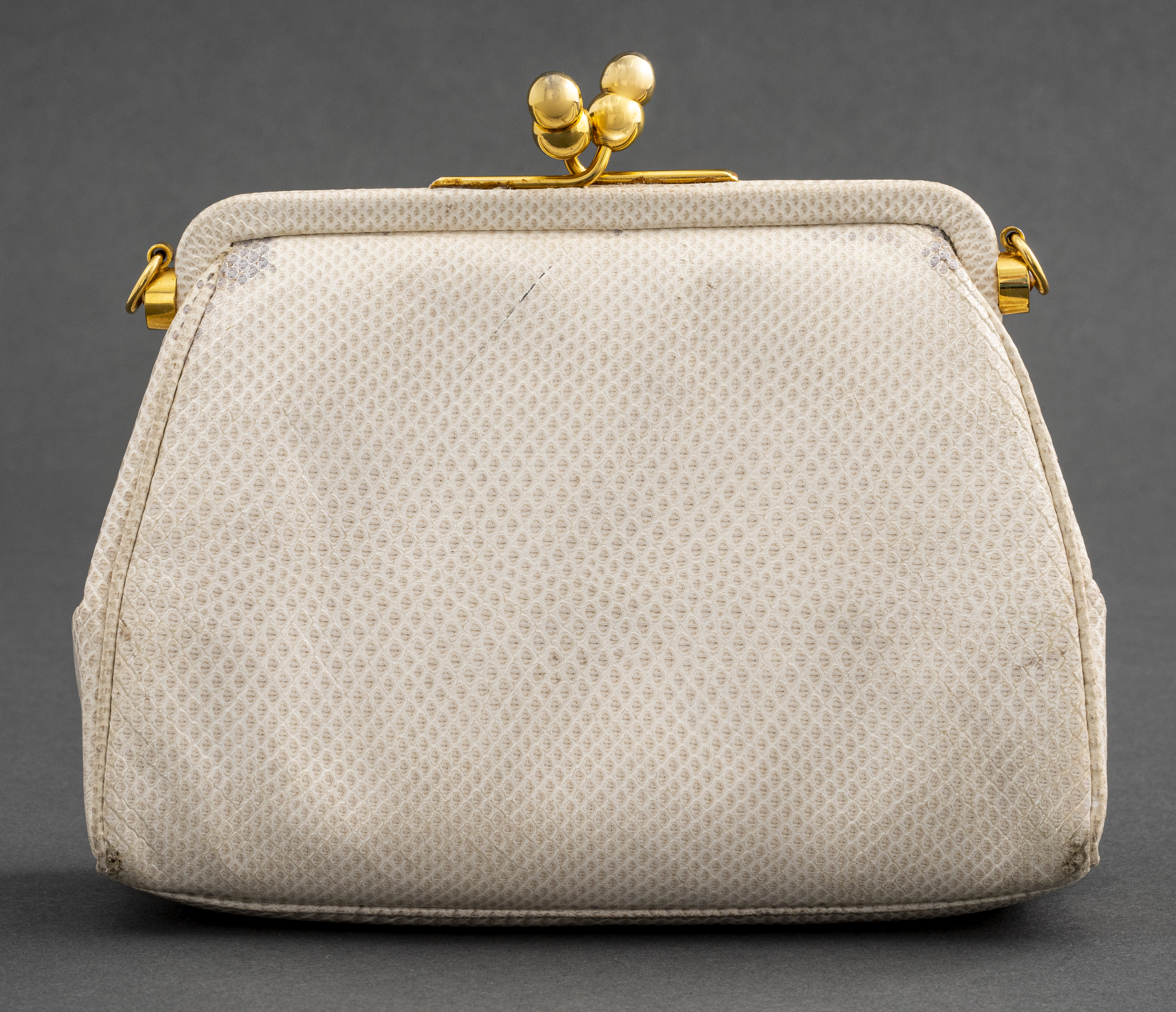 Appraisal: JUDITH LEIBER WHITE LEATHER HANDBAG Judith Leiber white leather handbag