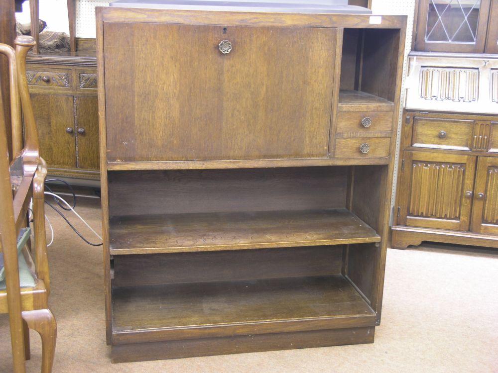 Appraisal: A 's dark oak bureau bookcase fall front enclosing shelves