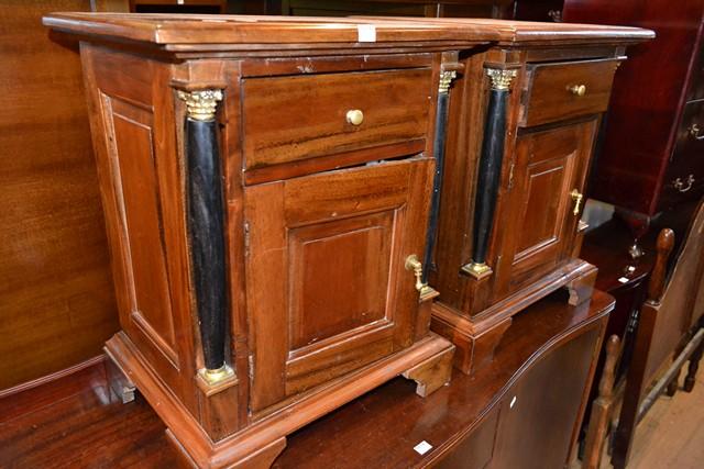 Appraisal: A PAIR OF BEDSIDE CABINETS WITH BLACK COLUMN FEATURES A