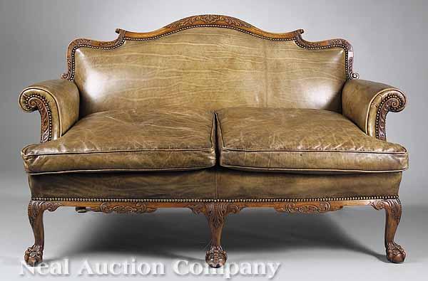 Appraisal: A Georgian-Style Carved Mahogany Settee late th c having an