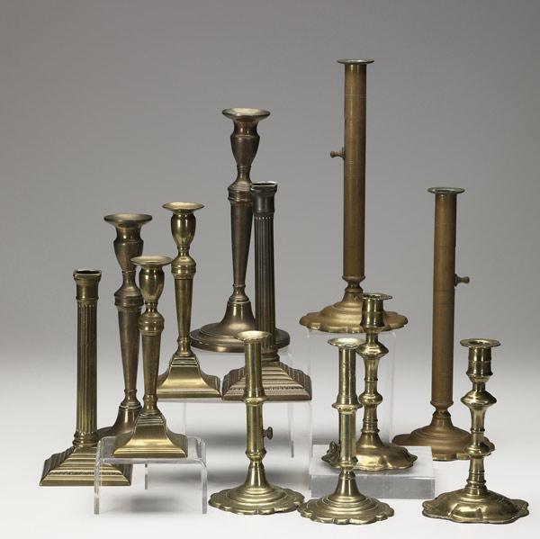 Appraisal: English brass bell metal candlesticks th C Six pairs in