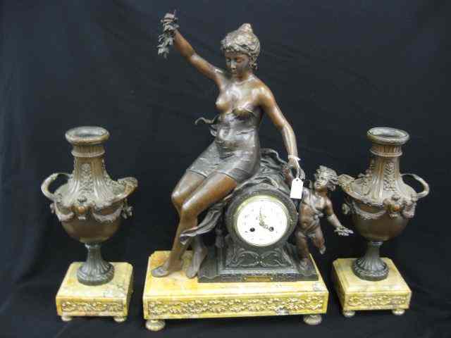 Appraisal: French Victorian Figural Mantle Clock Set bronzed maiden with cherub