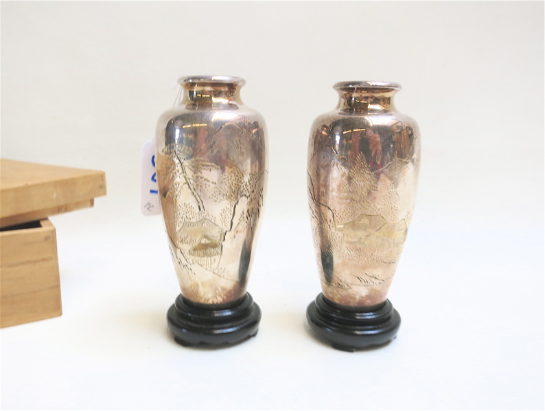 Appraisal: PAIR JAPANESE STERLING SILVER VASES raised on round hardwood plinths