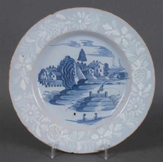 Appraisal: English blue and white Delftware plate circa floral decorated ''Bianco-Sopra-Bianco''